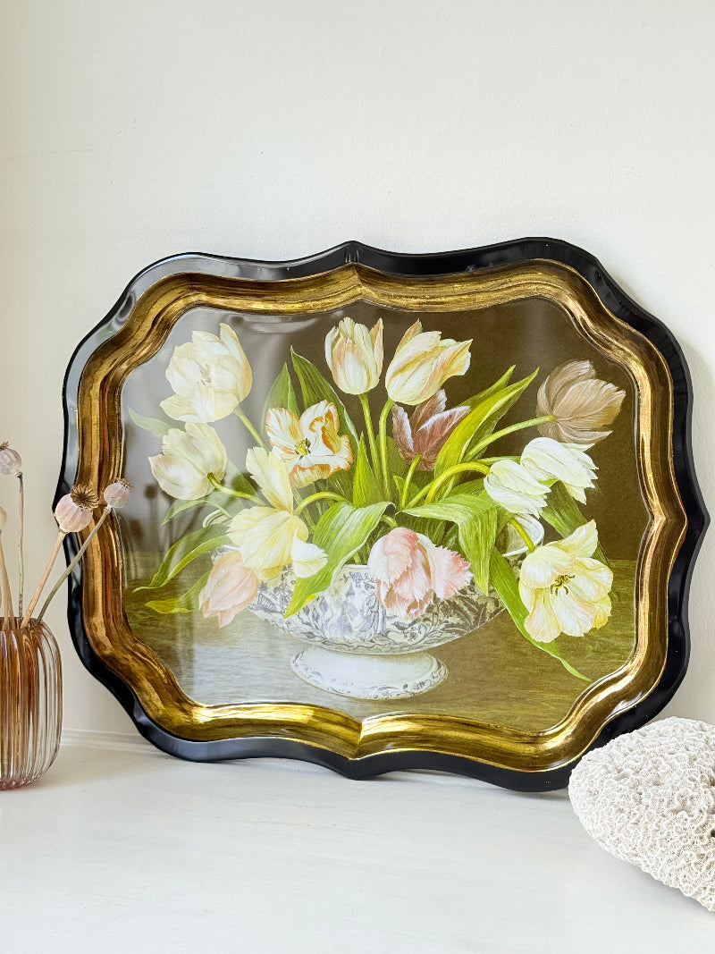 Large vintage printed tulip tray with scalloped edge and black lacquered finish, photographed on white surface.