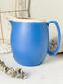 Vintage cornflower blue glazed stoneware jug with cream interior, pulled spout and curved handle for kitchen styling