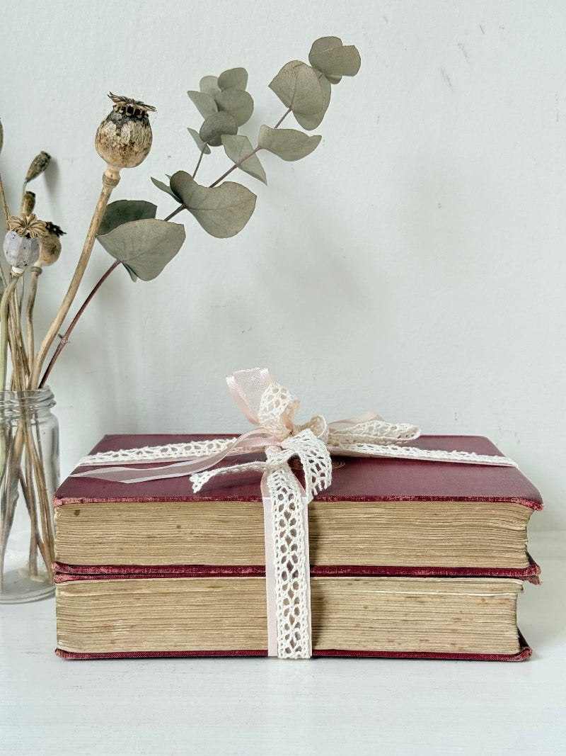 Vintage Rudyard Kipling book bundle of Kim and Many Inventions in red hardback covers, photographed on a white surface