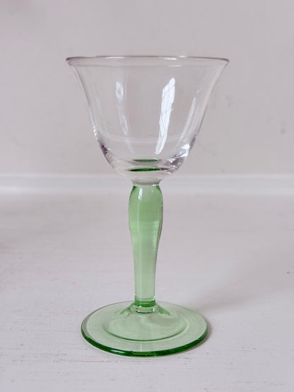 Set of five green stemmed liqueur glasses