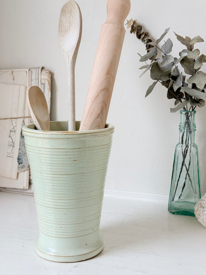 1960s Burton Ware ribbed stoneware pot in sage green, photographed on a white surface