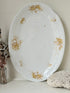 Antique Springer and Co Elbogen Senta porcelain platter in white with floral detail, photographed on a white surface