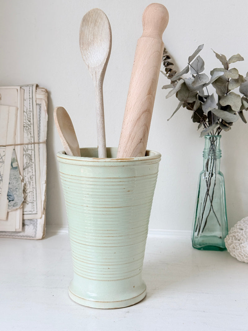 1960s Burton Ware ribbed stoneware pot in sage green, photographed on a white surface