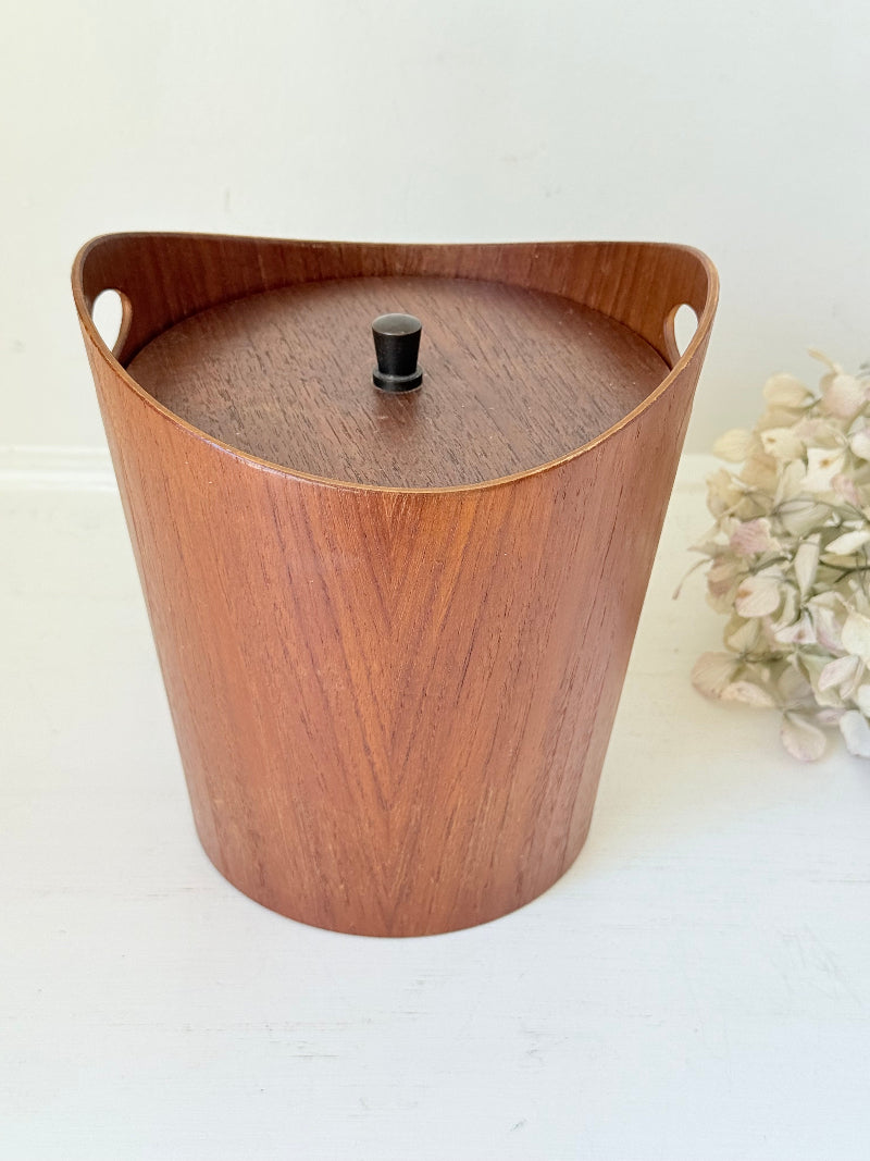 Vintage Swedish teak ice bucket with lid and white liner, photographed on a white surface