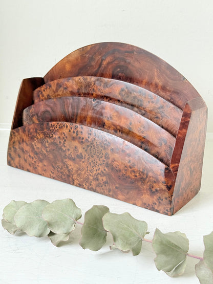 Three-slot curved letter rack made from polished burl wood with rich swirling grain, mid-century style desk organiser.