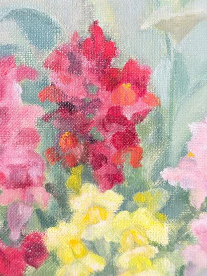 A close-up of a textured oil painting depicting vibrant pink, red, and yellow flowers with soft green leaves against a light, airy background.