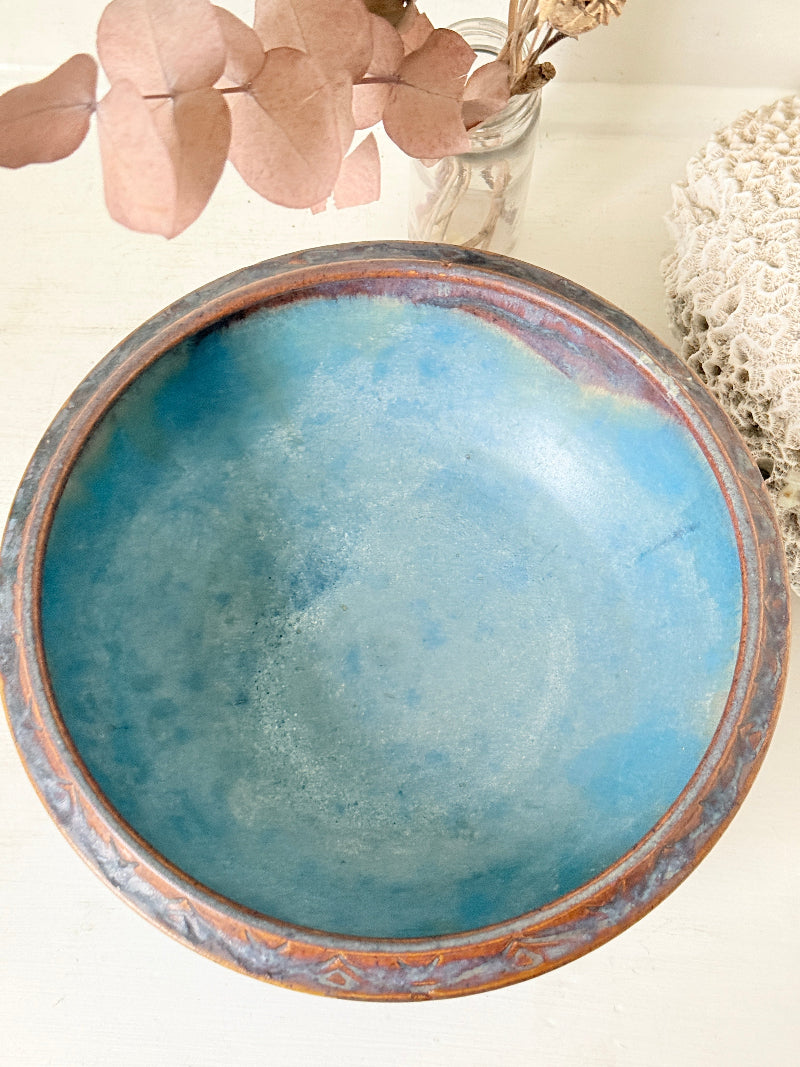 Vintage Bourne Denby stoneware fruit bowl in blue and brown glaze, photographed on a white surface