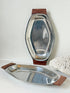 Pair of mid century stainless steel and teak crudites dishes photographed on a white surface