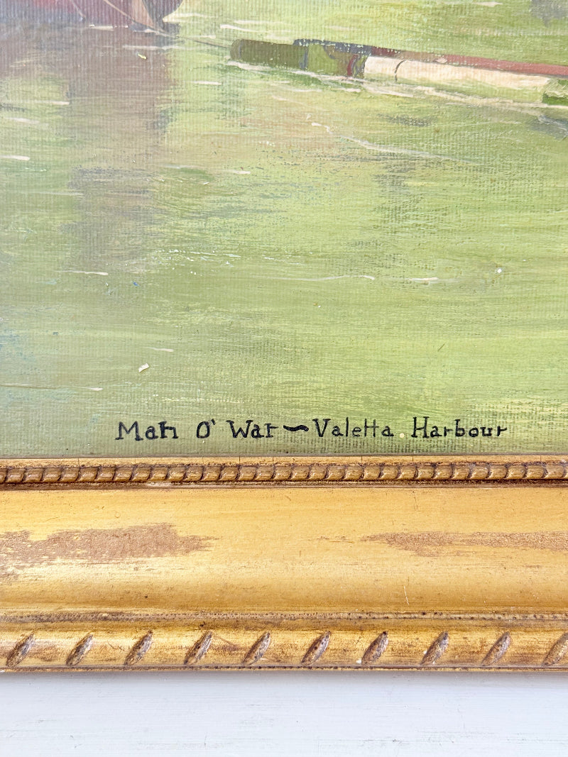 Vintage oil painting of man o’ war sailing ship with fishing boats in gilt frame