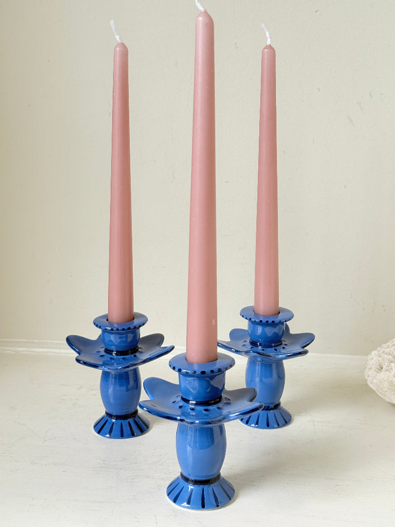Trio of &amp;Klevering Amsterdam cobalt blue ceramic candle holders with hand painted detail and pink taper candles