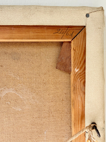 Close-up of the back of a framed canvas print, showing a natural wood frame, tan linen canvas, a metal hanging hook, and handwritten numbering &