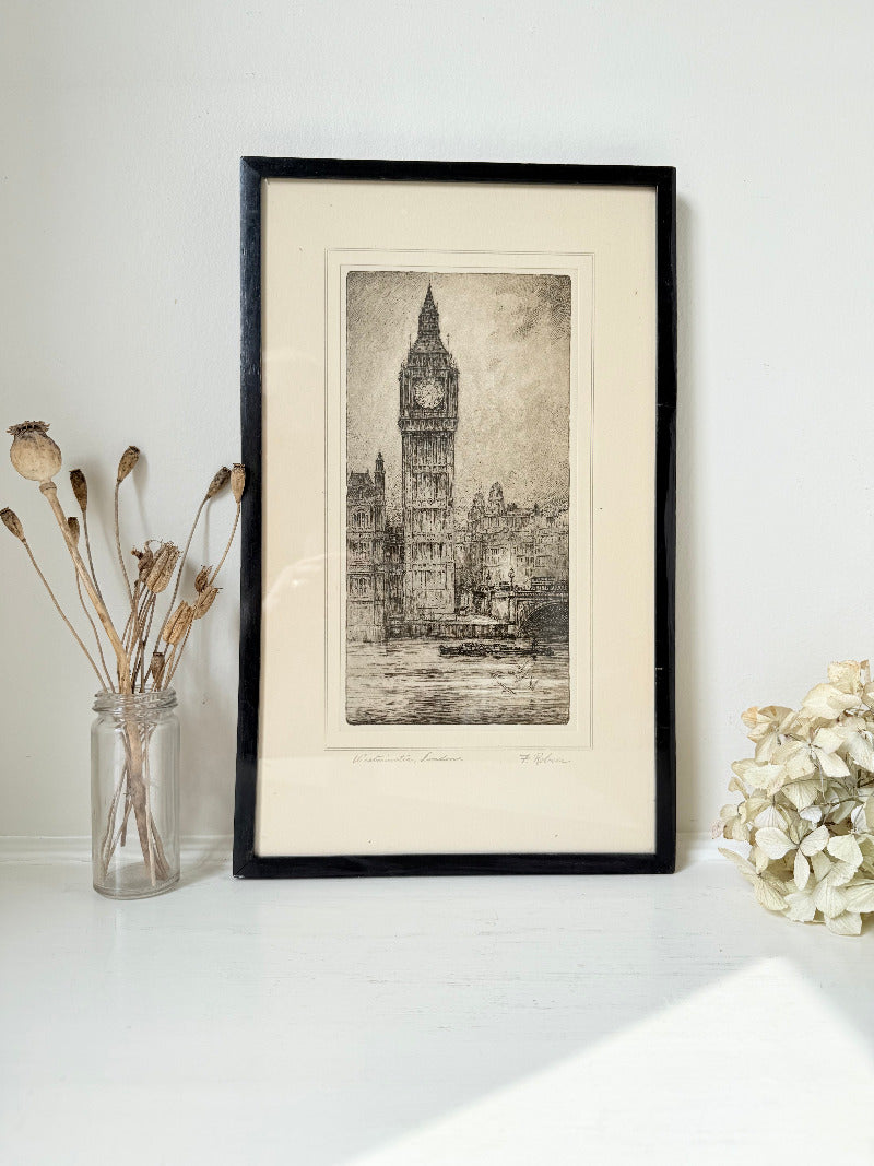Vintage framed print of Big Ben in London, black frame, photographed on white surface with dried flowers
