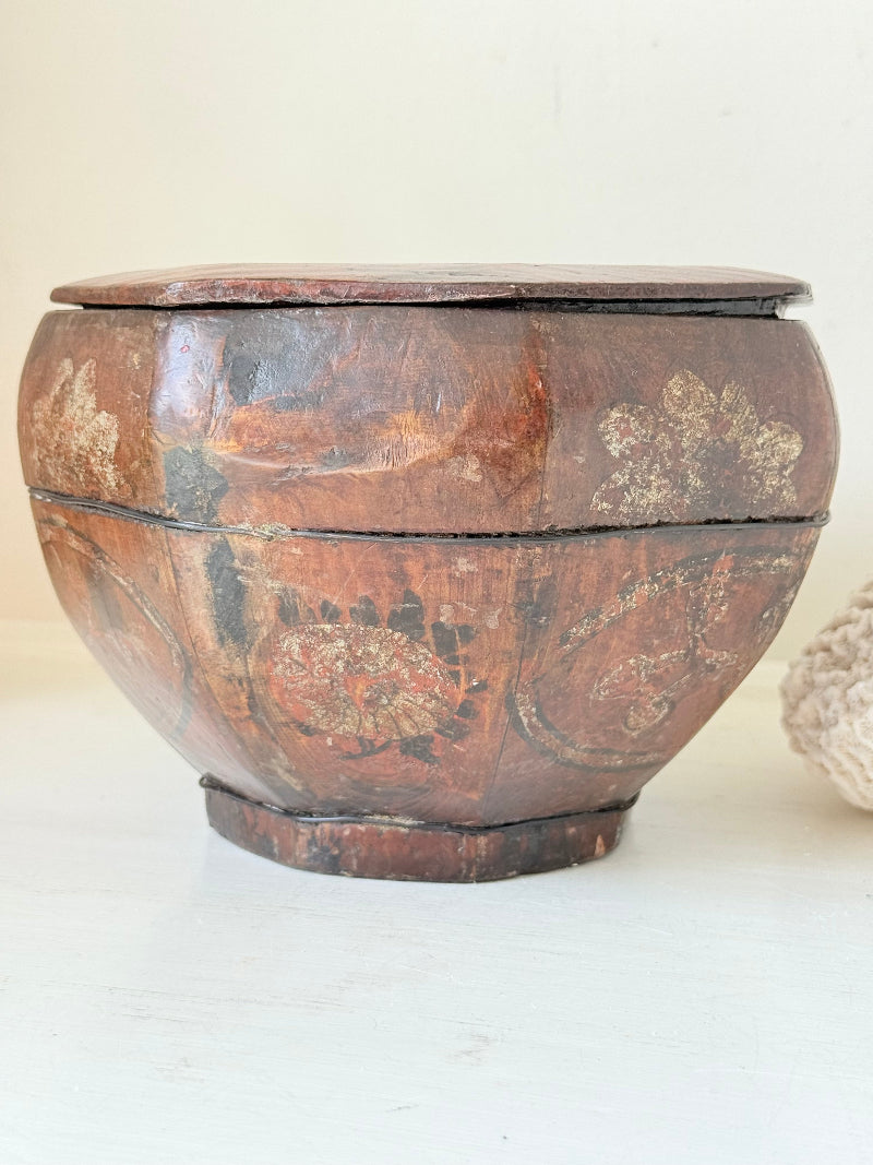 Antique octagonal Chinese lacquer basket with floral decoration and central figure, shown with lid on and off on a white surface


