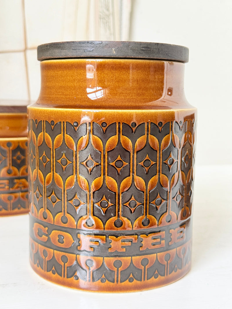 Hornsea Heirloom coffee tea and sugar canister set in autumn brown stoneware with teak lids photographed on a white surface