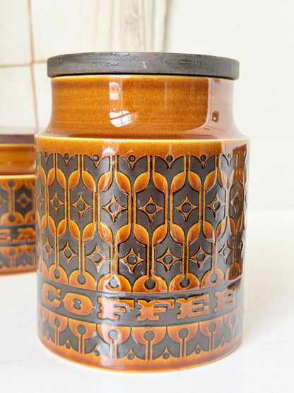 Hornsea Heirloom coffee tea and sugar canister set in autumn brown stoneware with teak lids photographed on a white surface