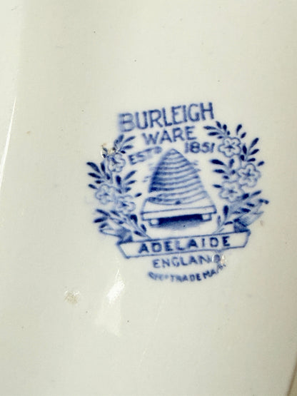 Vintage Burleigh Ware blue and white oval serving platter photographed on a white surface