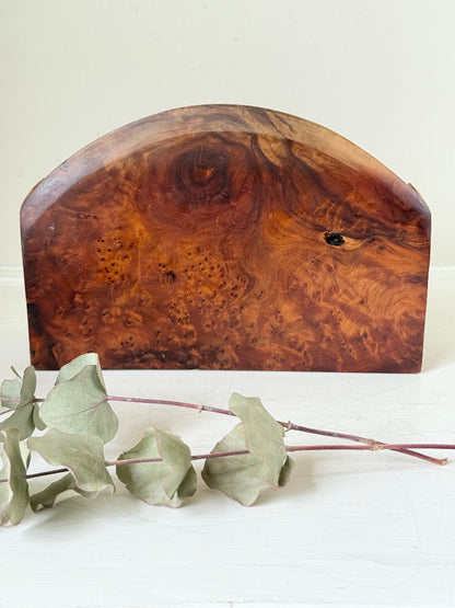 Three-slot curved letter rack made from polished burl wood with rich swirling grain, mid-century style desk organiser.