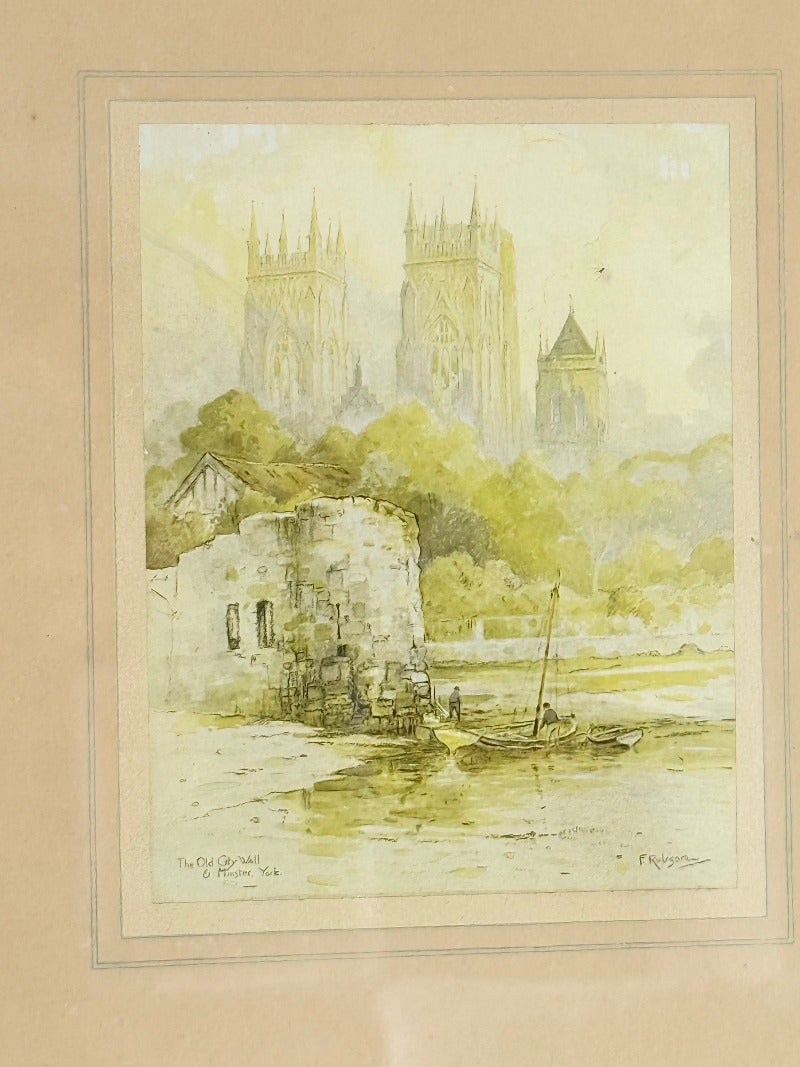 framed print of york minster and city walls in black frame, photographed on white surface
