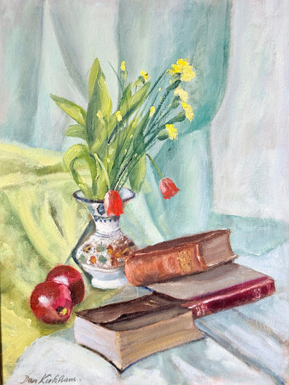 A still life oil painting depicting a white patterned vase filled with green leaves and yellow flowers, set next to two red apples and a stack of vintage brown books on draped light blue and green fabric.