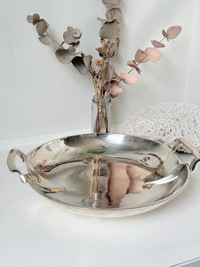 Art Deco silver plate serving dish with stepped handles on a white surface, Goldsmiths and Silversmiths Company Regent Plate