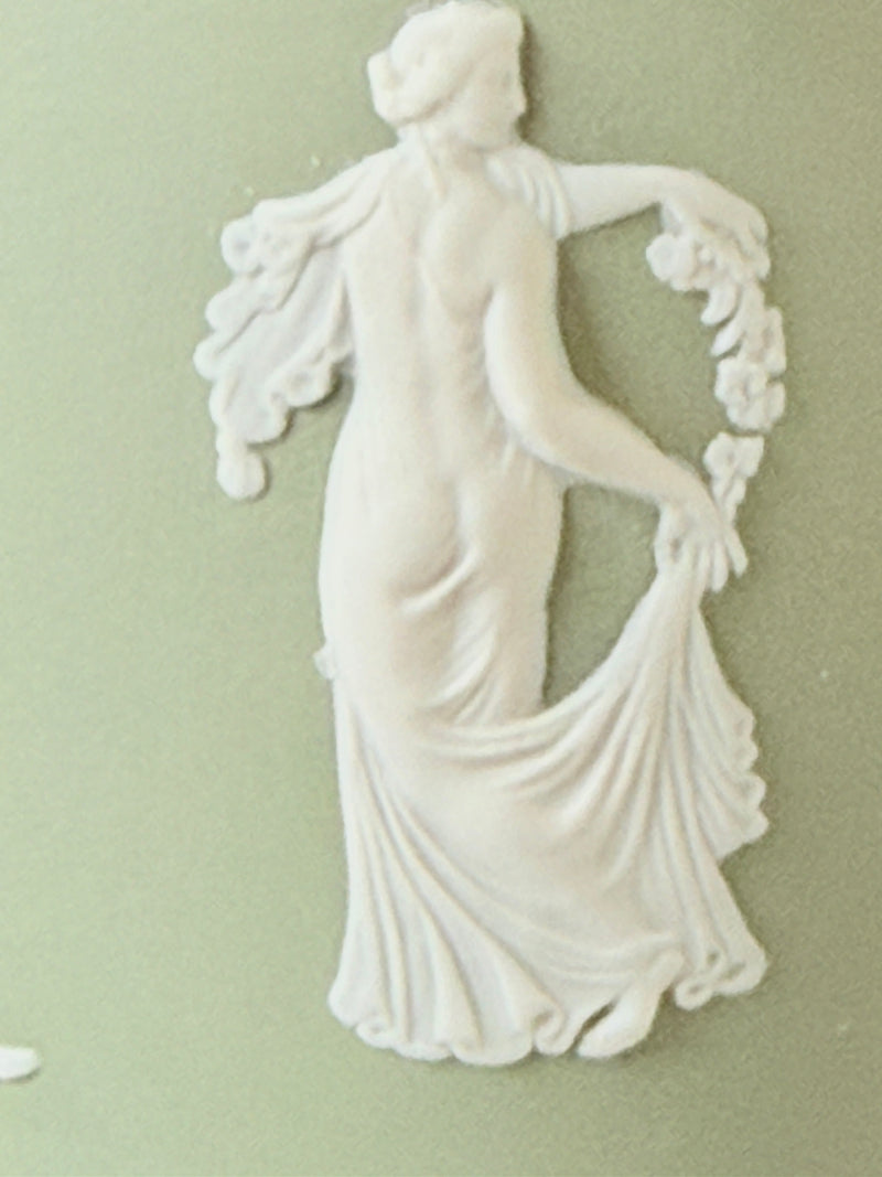 Vintage Wedgwood Jasperware sage green lidded jar with ball finial, decorated with white Dancing Hours neoclassical figures, styled with dried stems.