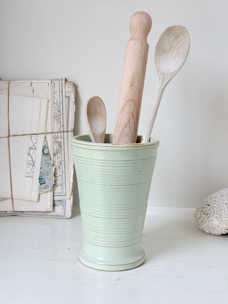 1960s Burton Ware ribbed stoneware pot in sage green, photographed on a white surface