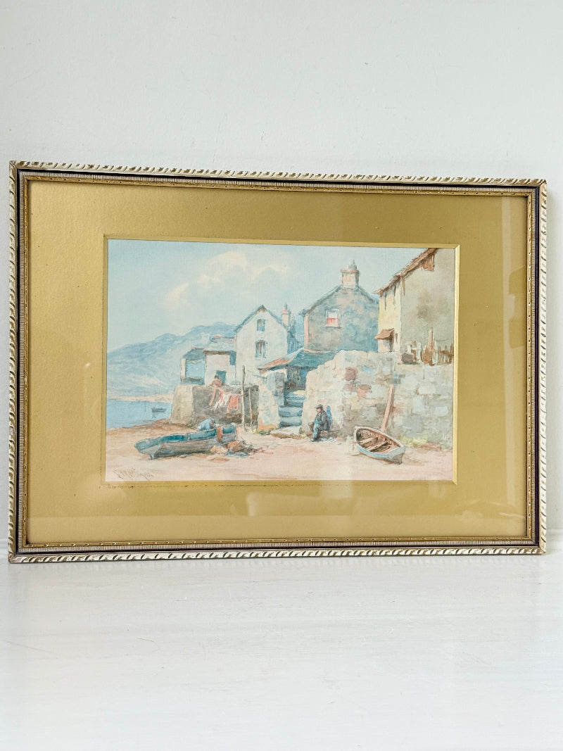Vintage watercolour of fishing village with boats, gold mount, and ornate gilt frame
