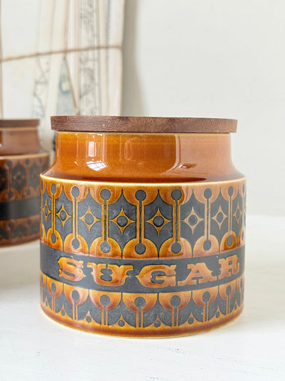 Hornsea Heirloom coffee tea and sugar canister set in autumn brown stoneware with teak lids photographed on a white surface