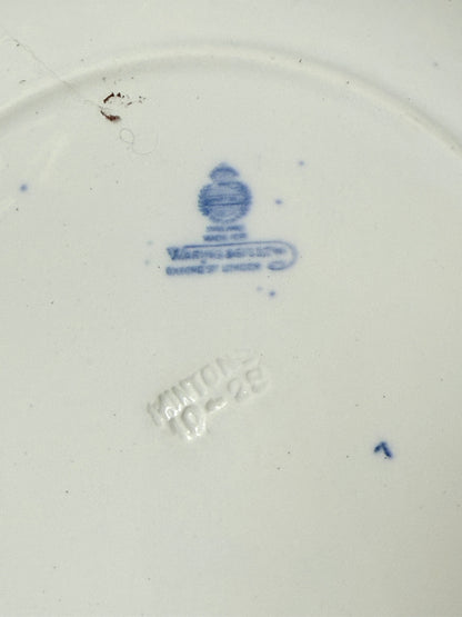 Minton Blue Willow serving dish dated 1928 with blue transfer pattern shown on a white surface.