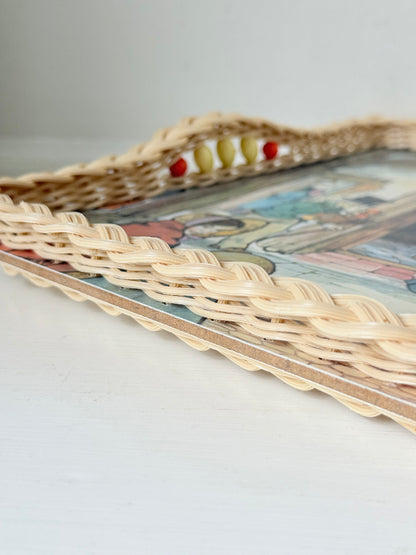 Vintage melamine tray with wicker effect edge and Victorian street scene, photographed on a white surface