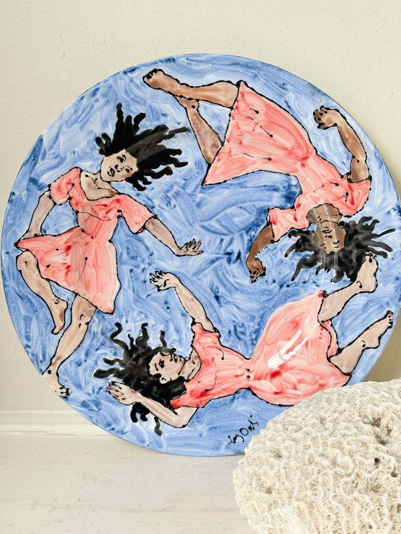 Signed Cary Outis studio art ceramic plate with figurative swimmers, blue painted ground and original Little Ouse artist label