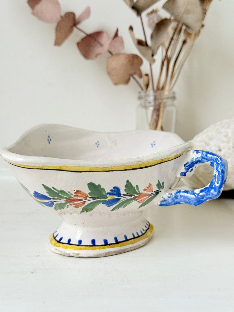 French Quimper faience sauce boat with Breton figure