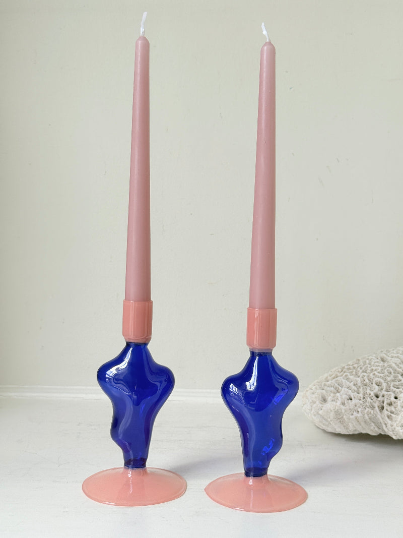 Pair of &amp;Klevering Amsterdam Flux glass candle holders in dark blue and pink with pink taper candles