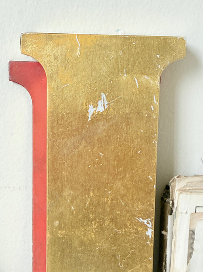 Vintage Shop Sign Letter N in Gold and Red with Serif Detail