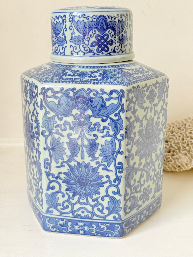 Blue and white floral ginger jar by Gisela Graham, photographed on a white surface