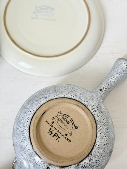 Denby Studio pair of lidded soup bowls with stands in grey and rust photographed on a white surface