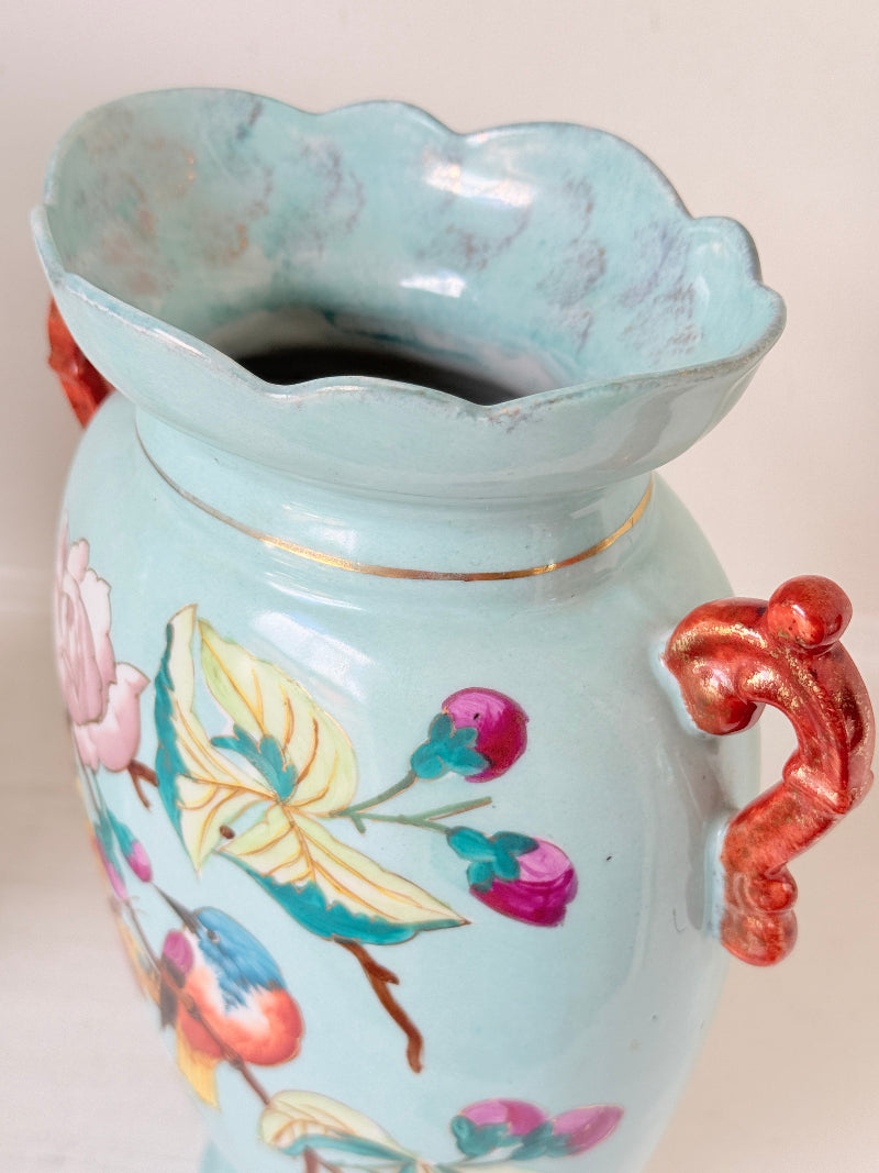 Pair of Paris porcelain Aesthetic Movement vases from the late 1800s, hand painted with birds, blossom and coral handles