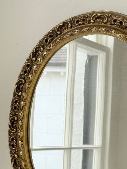 vintage gold oval mirror with ornate gilt painted frame