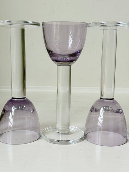 Set of 8 vintage lilac tinted liqueur glasses on a white surface