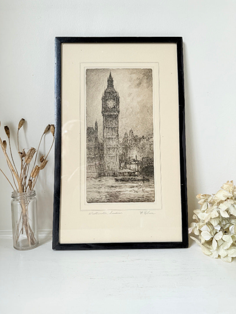 Vintage framed print of Big Ben in London, black frame, photographed on white surface with dried flowers