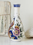 Dutch Delft polychrome vase by De Delftse Pauw hand painted with a peacock and flowers on white