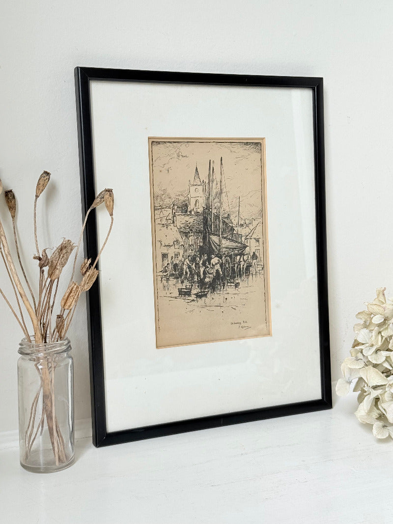 Vintage fishing harbour print in black frame, nautical scene wall art, styled on white surface with coastal decor accents