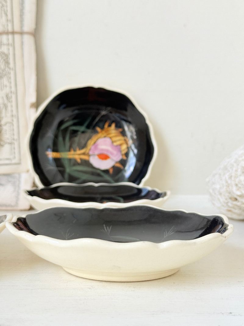Set of 4 vintage Henriot Quimper faience plates with hand painted shells, starfish, seaweed and black ground decoration