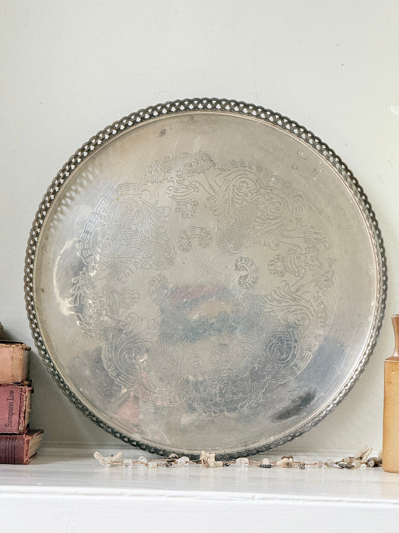 Vintage round silver plated gallery tray with pierced rim, engraved centre and aged patina for drinks or vanity styling