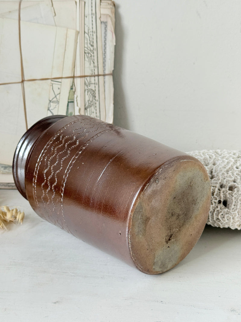 Vintage glazed stoneware pot with treacle brown glaze, incised banded decoration and wide rim for kitchen or shelf styling