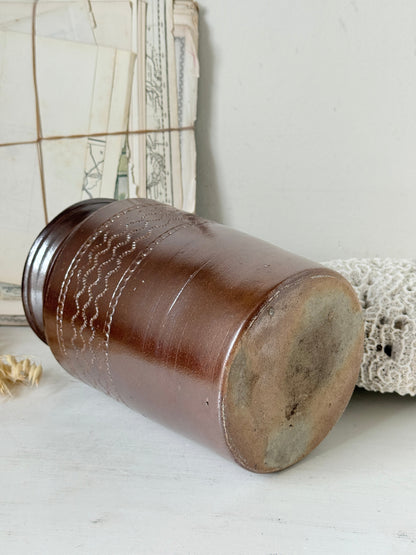Vintage glazed stoneware pot with treacle brown glaze, incised banded decoration and wide rim for kitchen or shelf styling