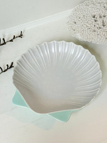 Poole Pottery scallop shell serving dish in white and seafoam glaze photographed on a white surface