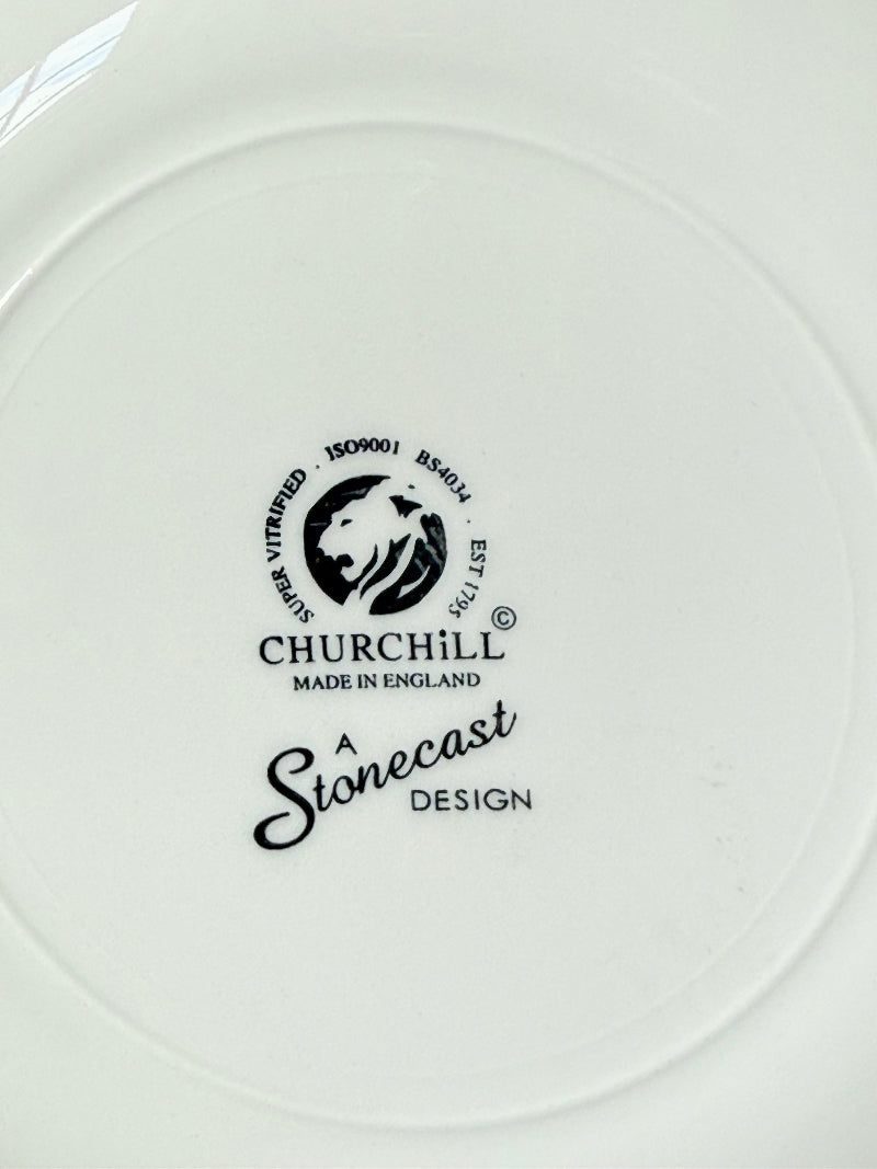Set of 8 Churchill speckled duck egg side plates with warm rim photographed on a white surface