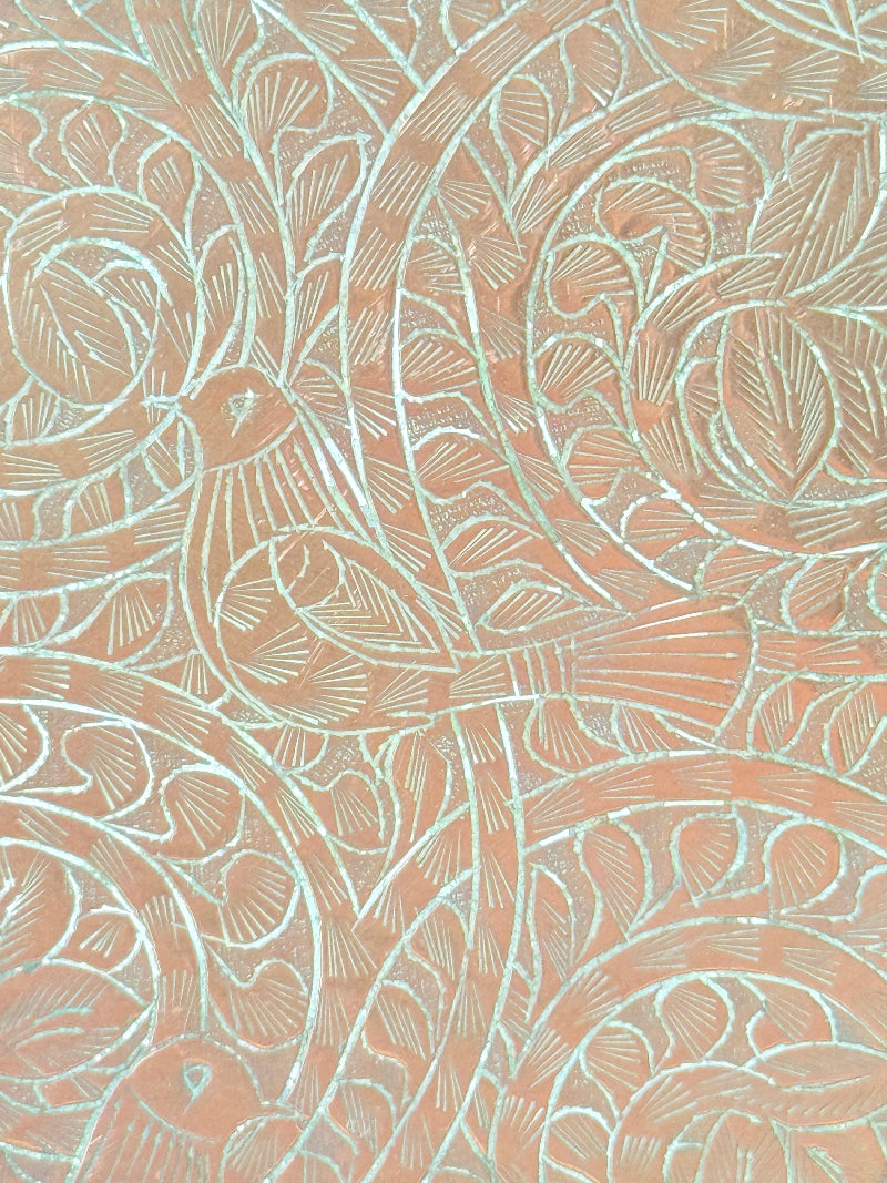 Vintage hand engraved copper tray with scalloped edge, bird and floral motif and warm aged patina for boho interiors