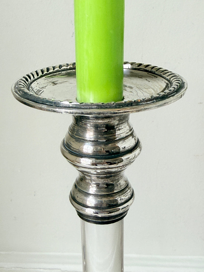 Pair of Hollywood Regency silver plate and Perspex Lucite candlesticks on bun feet with green taper candles
